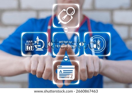 Doctor using virtual touch screen presses inscription: MEDICAL TERMINOLOGY. Medicine terms Concept. Medical Terminology Healthcare Education Science.