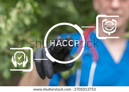 Doctor using virtual touch screen presses the abbreviation HACCP. HACCP - Hazard Analysis Critical Control Point Medical concept. Safety Food Healthcare Certification. Healthy Nutrition Standards.