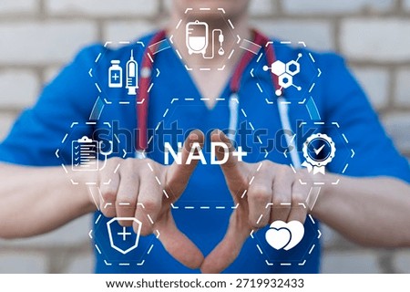 Doctor using virtual touch screen presses the text NAD+. NAD+ intravenous or syringe injection of vitamins, supplements, minerals medical concept.