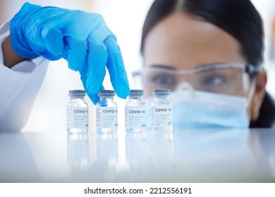 Doctor, Vaccine And Covid 19 In Lab, Hospital Or Clinic For Safety, Health And Wellness Against Virus. Woman, Medic And Ppe At Work In Science For Vaccination, Healthcare And Cure For Coronavirus