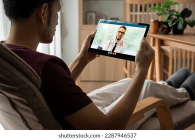 Doctor video call online by modish telemedicine software application for virtual meeting with patient - Powered by Shutterstock