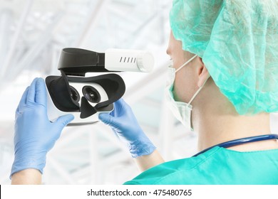 Doctor With Virtual Reality Glasses On White Background