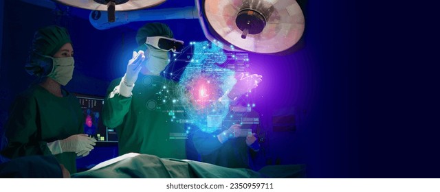 Doctor with virtual reality in operation room in hospital.Surgeon analyzing patient heart testing result and anatomy on technological digital futuristic virtual interface,VR,AR augmented concept.