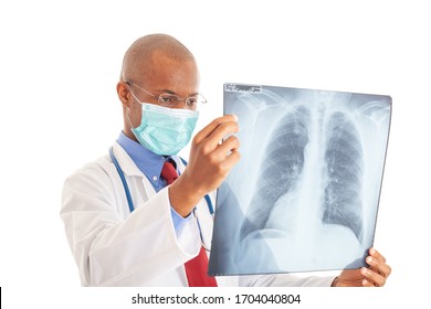 Doctor Wearing A Mask While Holding A Lung Radiography, Coronavirus And Pneumonia Concept