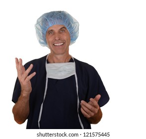 Doctor Wearing Navy Blue Scrubs And Blue Hair Cover With Mask Hanging Down Smiling With Hands Up Isolated On White