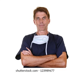 Doctor Wearing Navy Blue Scrubs With Arms Crossed Isolated On White