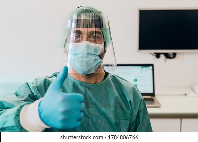 Doctor wearing ppe face surgical mask and visor fighting against corona virus outbreak - Health care and medical workers concept  - Shutterstock ID 1784806766