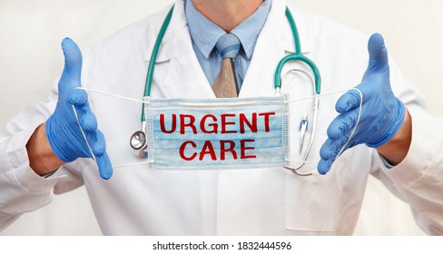 The Doctor Is Wearing A Protective Mask With The Inscription URGENT CARE. Healthcare Concept