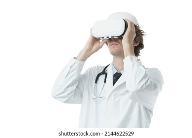 A Doctor Wearing VR Headset Which Is Looking Up Over Isolated White Background. Concept Virtual Reality Medical Healthcare Service Technology. Virtual Medical Education Learning By AR Study. Metaverse