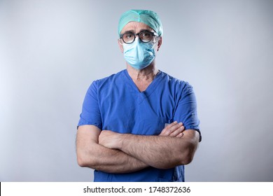 Doctor In White Coat And Mask, Isolated On White Background