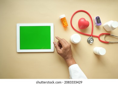 Doctor In White Coat Is Using A Digital Tablet, Top Down 