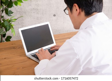 The Doctor Who Works Using Laptop