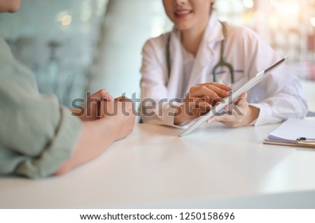 Doctor woman consulting patient sitting at doctor office. prevention of men diseases, healthcare, medical service, consultation, concept.