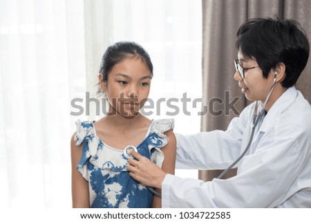 asian women being examined by doctor Asian women being examined by doctor