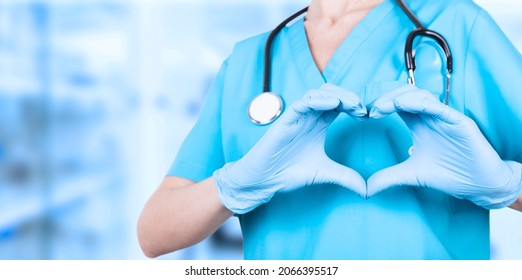 Doctor Woman, Hands In Medical Blue Gloves Forming A Heart Shape. We Love You. Copy Space. Awareness Poster.