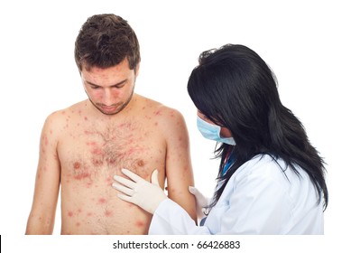 Doctor Woman With Mask And Gloves Examine  Skin Rash To A Man With Chickenpox Isolated On White Background