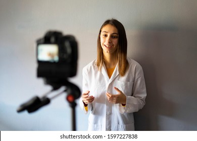 Doctor woman recording a health and care video for her Vlog of Medicine. Concept of Medical Care and Technology. - Powered by Shutterstock