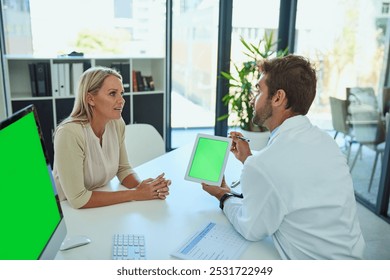 Doctor, woman and tablet green screen in office for patient test results, digital xray or consultation for treatment plan. Surgeon, person and technology with chroma key display for medical diagnosis - Powered by Shutterstock