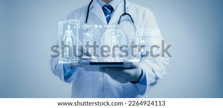 Doctor work on tablet with experiences a virtual interface with human body analysis. Digital healthcare and network connectivity on a modern interface. medical technology and futuristic concept