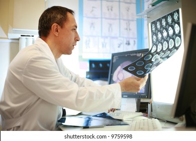 Doctor Working With CT Scan