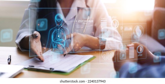 Doctor working office research studying heart disease illness, using modern computer technology display assistance artificial intelligence AI, healthcare medical staff in hospital clinic office - Shutterstock ID 2240137943