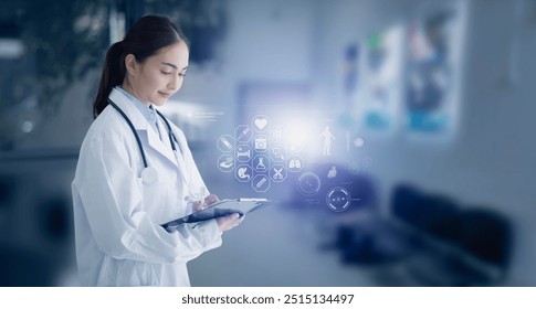 Doctor working with patient data entry in a hospital or clinic, medical technology, Healthcare, Medical and healthcare concept. - Powered by Shutterstock