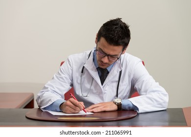 Doctor Writing A Letter - Notes Or Signing A Document Or Agreement