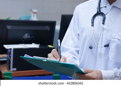 Doctor Writing A Medical Prescription