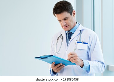 Doctor Writing Notes Stock Photo 191093459 | Shutterstock