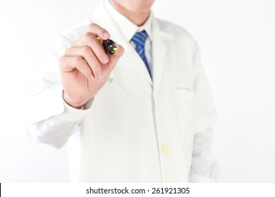 Doctor Writing On Blank Glass Board Or Virtual Screen,(shallow DOF)