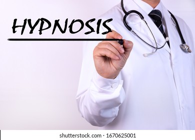 Doctor Writing Word Hypnosis With Marker Medical Concept. Doctor's Recommendations