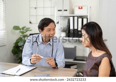 Doctor-Patient Discussion and Medical Guidance. A physician explaining treatment options to a patient in a clinical setting.