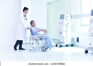 Doctors Care For Sick People With Wheelchairs In The Dialysis Room.