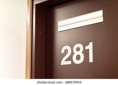 Doctor's Door. The Entrance To The Room Of A Psychologist, Psychiatrist, Nurse Or Dentist In A Hospital Or The Office Of Principal Or Curator In School. Universal Door With Number And Empty Sign.