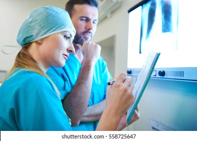Doctors examining the medical x ray