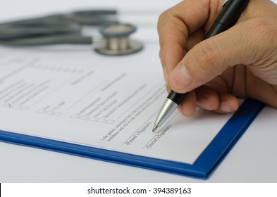 Doctor's Hand Filling Check List Of Transferred Prescription Note, Close Up, Medical And Healthcare Concept.