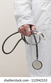 Doctor's Hand Holding Stethoscope