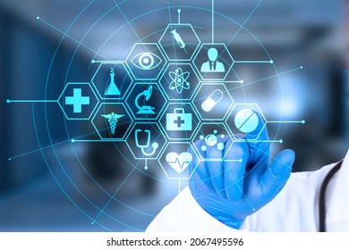 Doctor's hand points to the virtual screen, Medical innovation concept background. Health care icons on a blue background. High quality photo