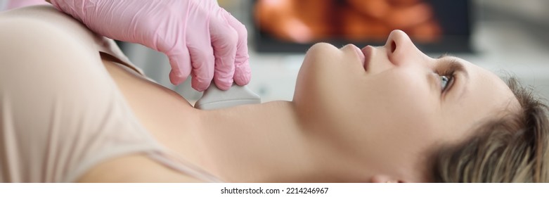 Doctor's Hands On Woman's Neck, Ultrasound Thyroid Gland