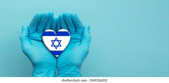 Doctors Hands Wearing Surgical Gloves Holding Israel Flag Heart