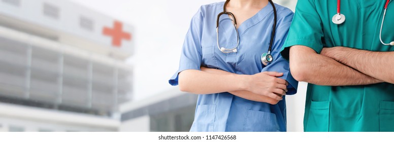 Doctors with hospital background. Healthcare and medical service. - Shutterstock ID 1147426568