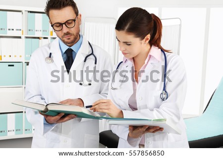 Doctors with medical documents, concept of  consulting