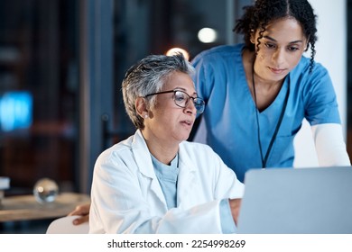 Doctors, nurse or laptop in night teamwork, medical research or surgery planning in wellness hospital. Talking, thinking or healthcare women on technology for collaboration help or life insurance app - Powered by Shutterstock