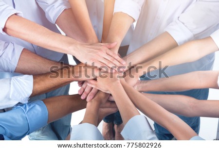 Doctors and nurses coordinate hands