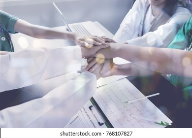 Doctors And Nurses Coordinate Hands Together. Concept Teamwork In Hospital,multiethnic Medical Team Stacking Hands 