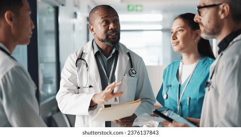 Doctors, nurses and team planning, hospital management and workflow discussion for schedule, advice or services. Healthcare worker, mentor and people with medical documents, clinic files and meeting - Powered by Shutterstock