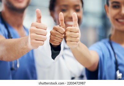 Doctors, nurses or thumbs up hands in success, teamwork collaboration or trust with medical winner goal. Zoom on thank you, motivation and vote sign on man and support women in healthcare hospital - Powered by Shutterstock