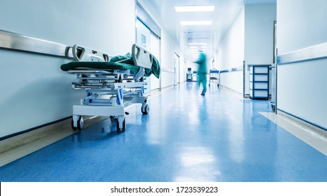 Doctors or nurses walking in hospital hallway, blurred motion. - Shutterstock ID 1723539223
