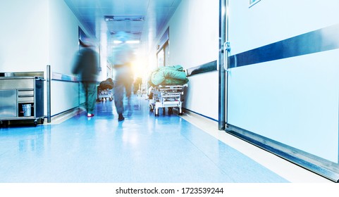 Doctors Or Nurses Walking In Hospital Hallway, Blurred Motion.