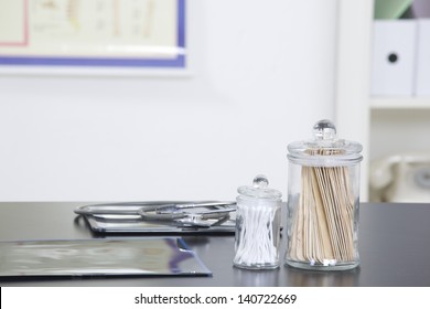 Doctor's office desk with medical supplies documents stethoscope
